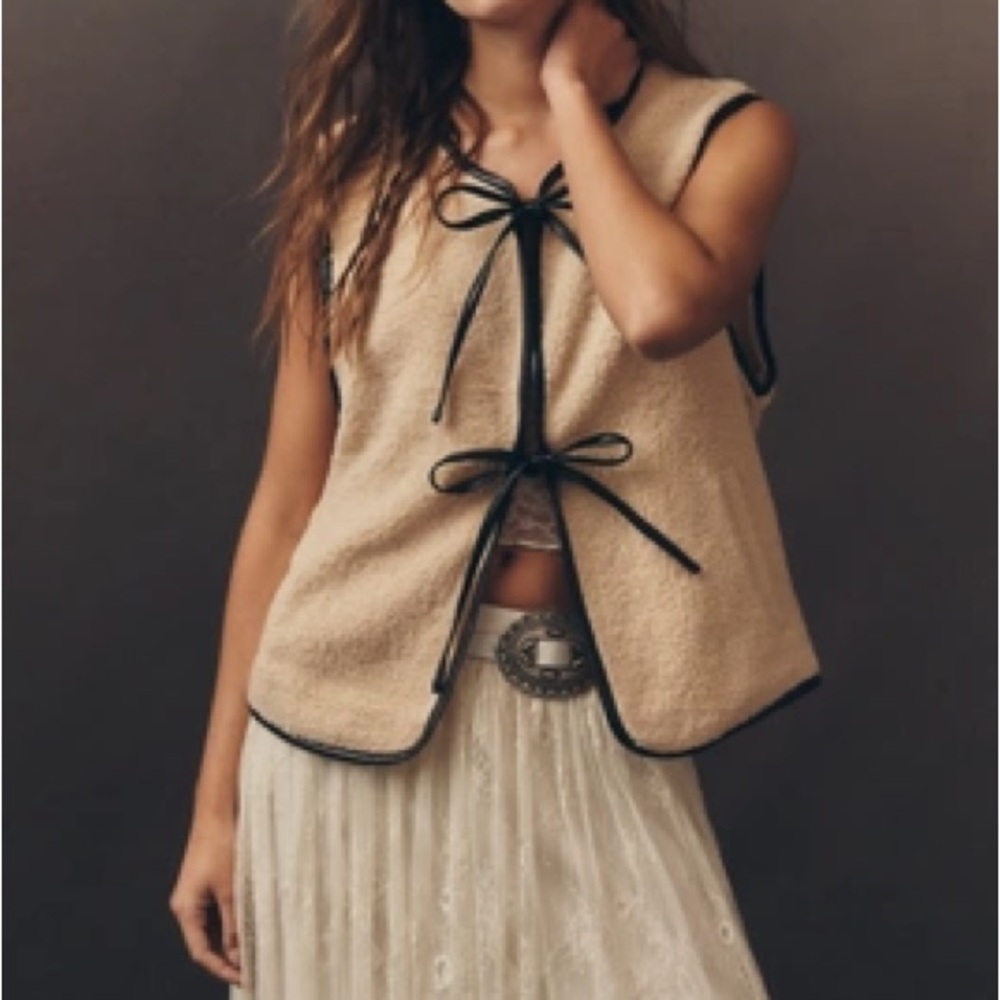 Tan Vest with Black Trim